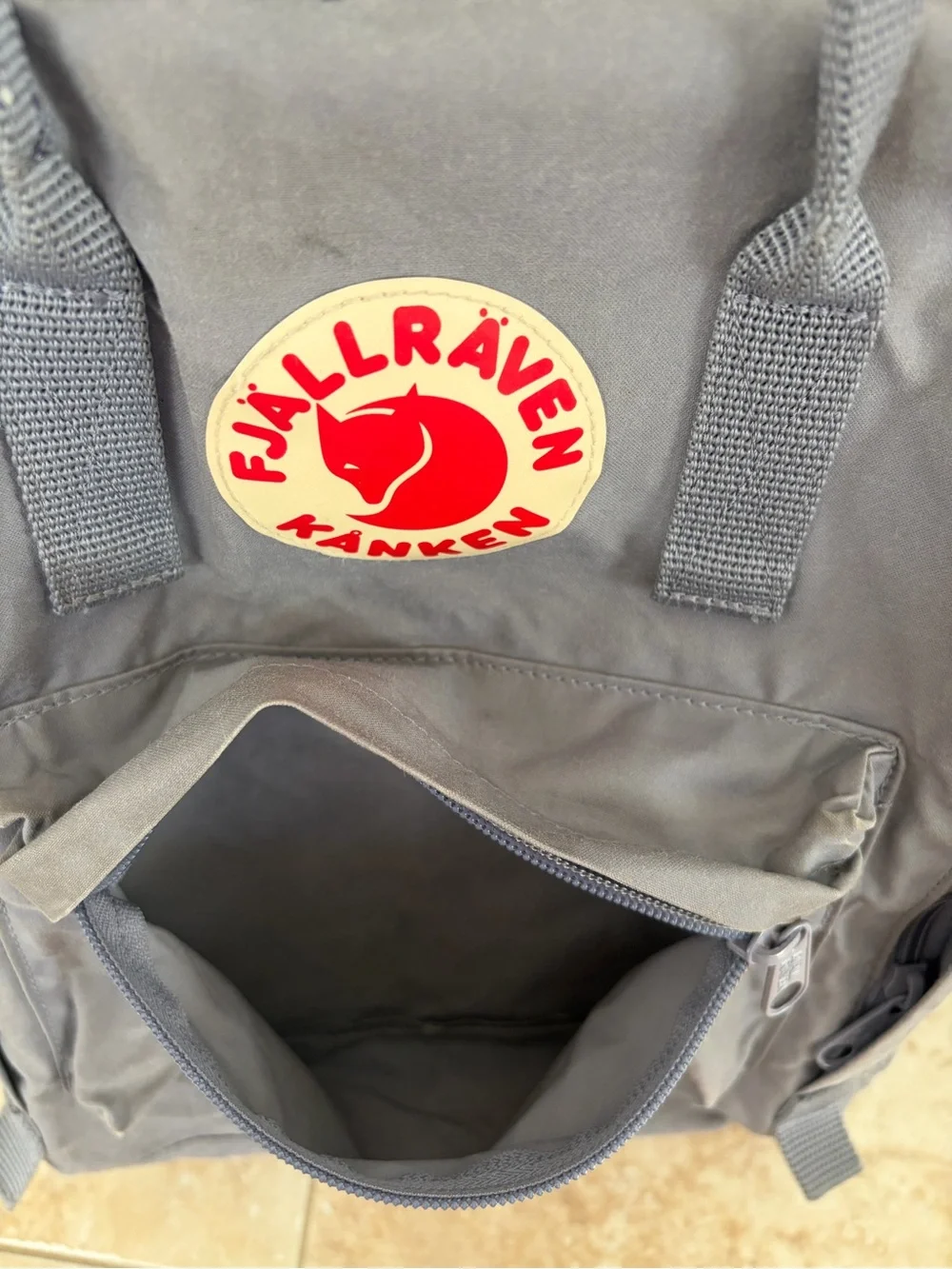 Fjallraven Kanken Backpack in Gray with Red Logo